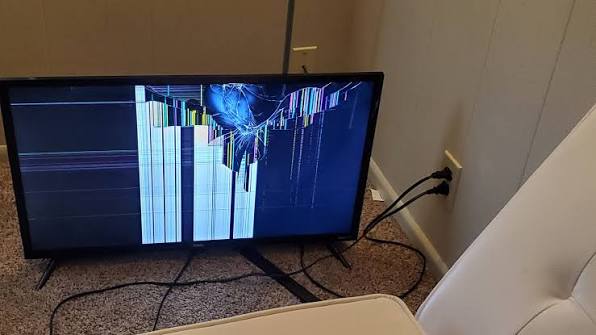 Checkout photo — cracked TV screen